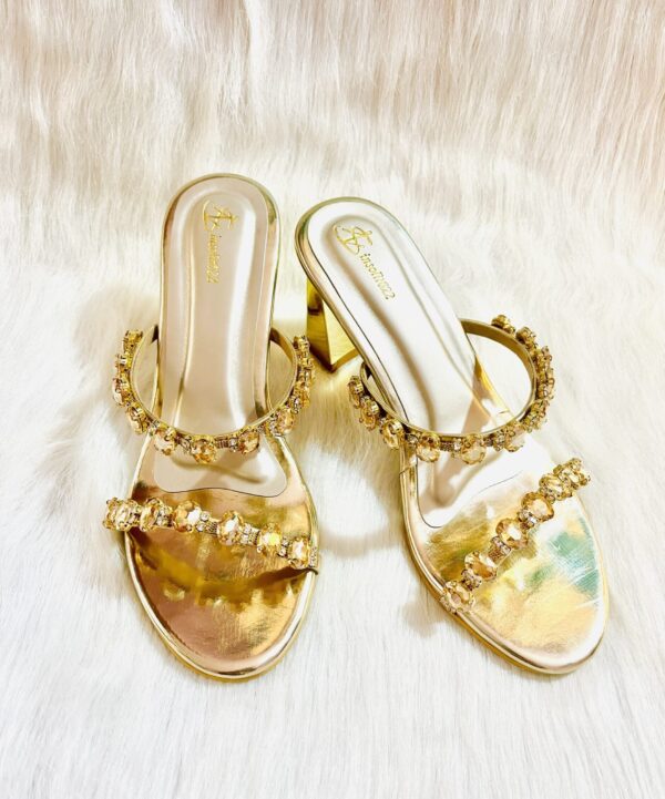 Gold heel